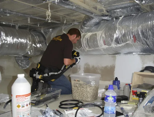 Grafton Air Duct Cleaning specialist performing professional mold removal from air ducts in Grafton