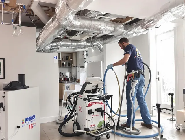 Grafton Air Duct Cleaning technician performing advanced pure duct cleaning with specialized equipment in Grafton