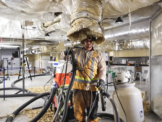 Professional vacuum insulation removal by Grafton Air Duct Cleaning expert in Grafton